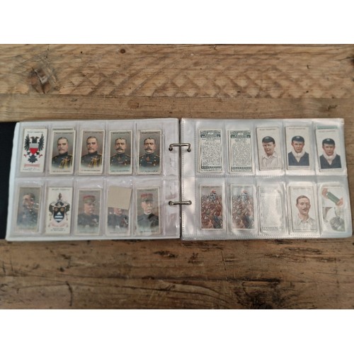 307 - Five albums of mainly assorted cigarette cards.