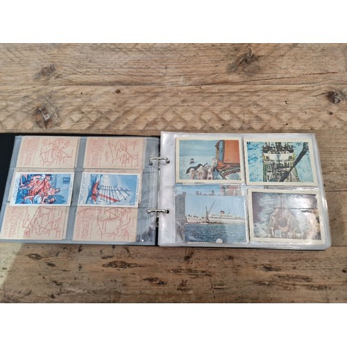 307 - Five albums of mainly assorted cigarette cards.