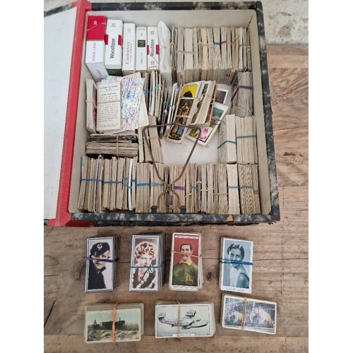 305 - Three files of assorted cigarette cards.