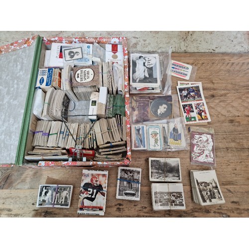 305 - Three files of assorted cigarette cards.