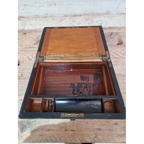 314 - A 19th century brass bound burr walnut writing slope.