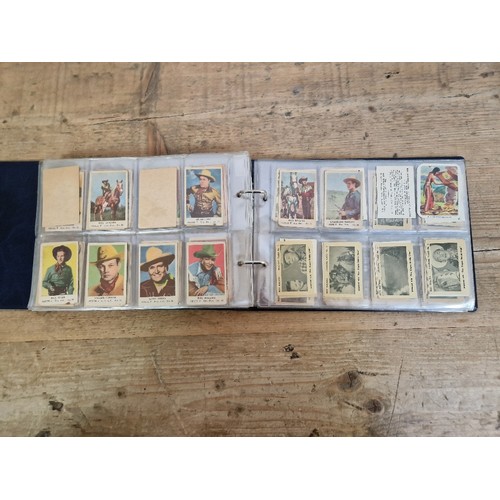 301 - Two albums of American themed collectors cards, cigarette cards including Red Indians, The Wild West... 