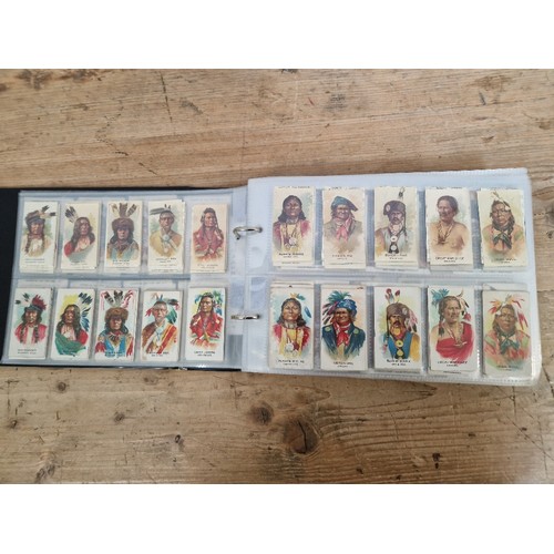 301 - Two albums of American themed collectors cards, cigarette cards including Red Indians, The Wild West... 