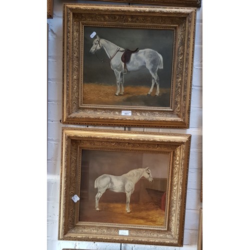 801 - Early 20th century school, pair of oils on canvas, horses in stables, 34.5cm x 29.5cm, each signed '... 