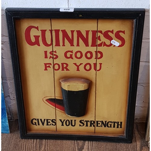 808 - A wooden Guinness advertising sign, 'Guinness is good for you, gives you strength', 38cm x 45.5cm.