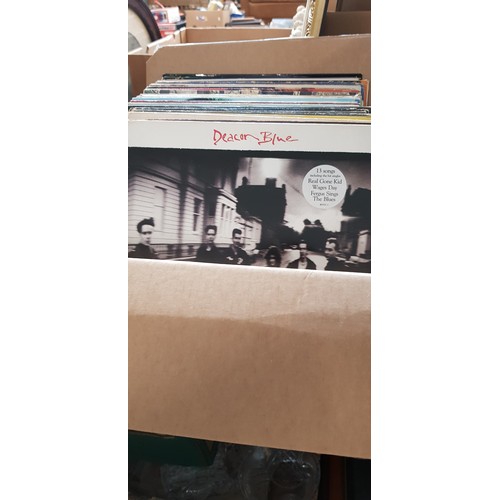 303 - A box of vinyl LP records, various artists, mostly rock and pop.