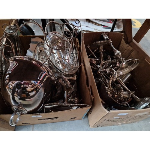 82 - Two boxes of silver plated ware including teapots, dishes, cake stand, cutlery and some pewter.