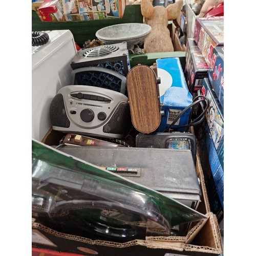 101 - A box of electricals to include radios, CD player, etc.