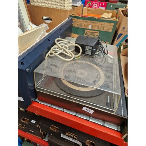 130 - A Philips record deck and a Yamaha PortaSound with battery power pack.