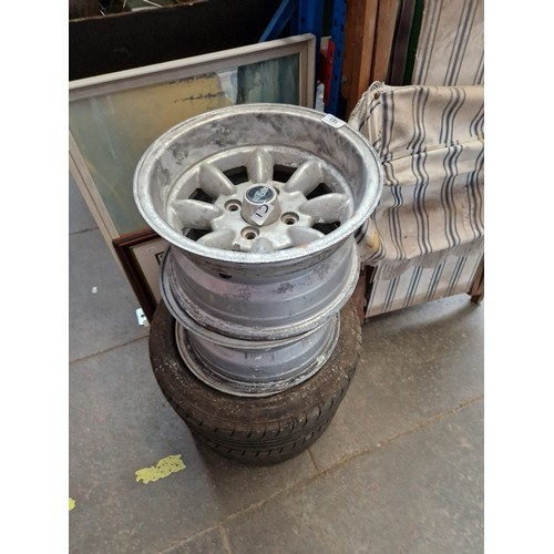 183 - A set of 4 Superlight 7JJ X 13 alloy wheels, 2 with tyres.