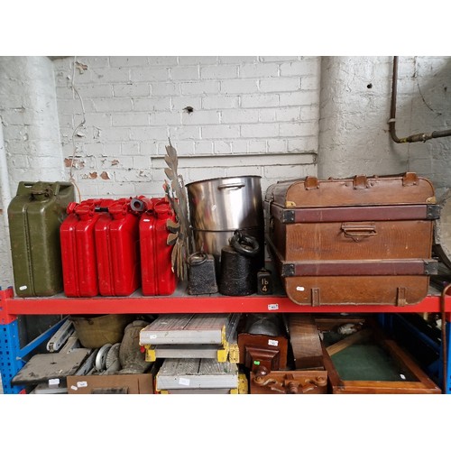 163 - A vintage tin trunk, two stainless steel large pans, 3 imperial weights, a metal ornament and 4 jerr... 