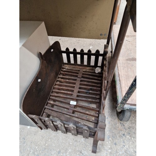 198 - A metal fire grate.