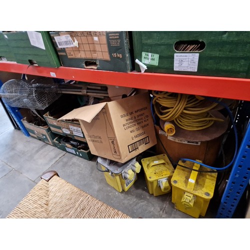 234 - Various boxes of garage ware to include transformers, cable reel, vermin trap, drain rods, shackles ... 