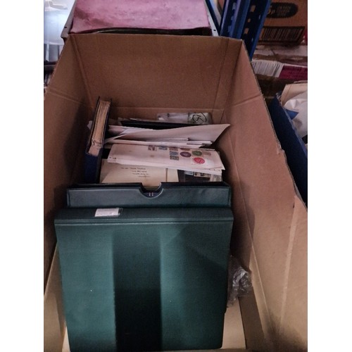 231 - A box of assorted stamp albums and first day covers etc.