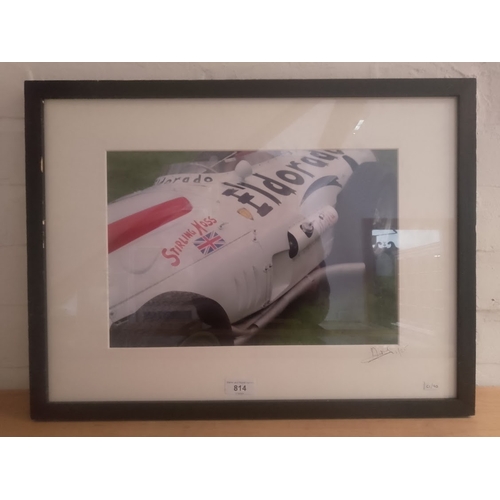 814 - A limited edition photographic print of Sterling Moss' 1958 Maserati 'Elderado', numbered 1/25 and s... 