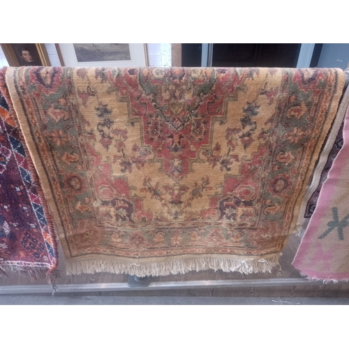 822 - A Middle Eastern style wool carpet, 162cm x 90cm.