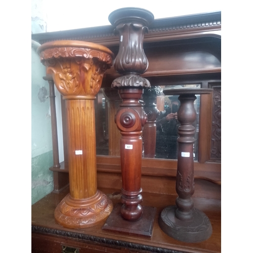 837 - Three carved wood pedestals