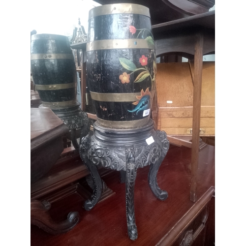 840 - A Chinese black lacquer plant stand together with a bargeware barrel.