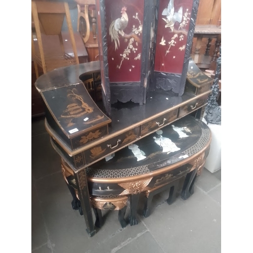 850 - A chinoiserie black lacquer and gilt decorated desk.