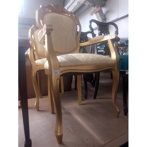 874 - A pair of French style gilt armchairs.