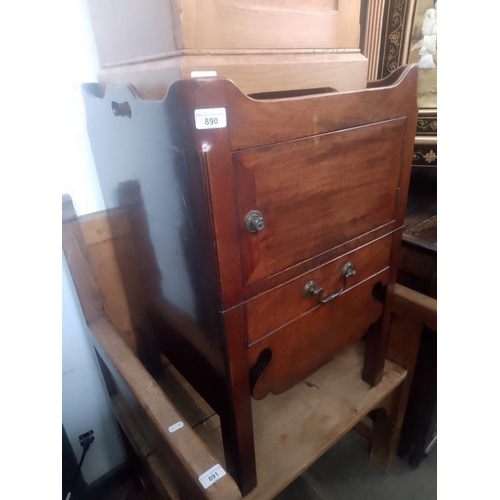 890 - A Georgian mahogany commode.