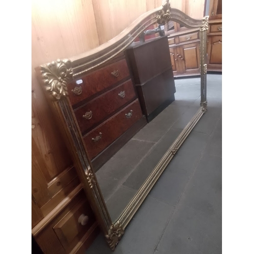 896 - A large modern gilt framed overmantle mirror.