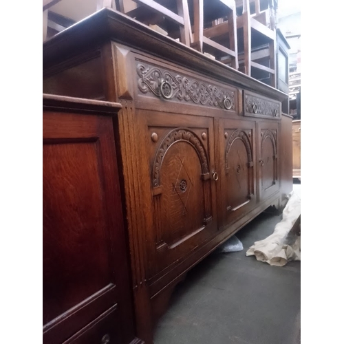 904 - An early 20th century oak sideboard.