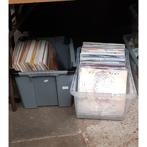 374 - Two boxes of vinyl records, various artists & genres including rock and pop.