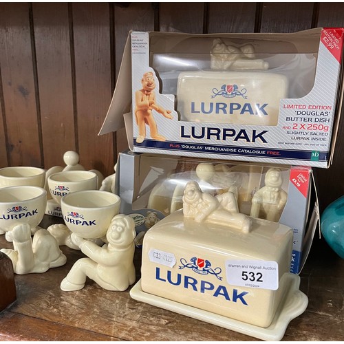 532 - Lurpak items - 2 butter dishes, 2 toast racks and 4 eggcups (one butter dish and one toast rack are ... 