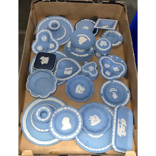 566 - A box of blue Wedgwood jasperware