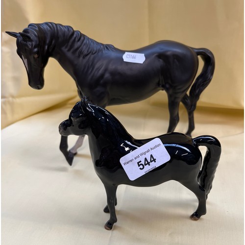 544 - A matt black Beswick horse figure, appx 18cm tall, and a glazed black horse with John Beswick signat... 