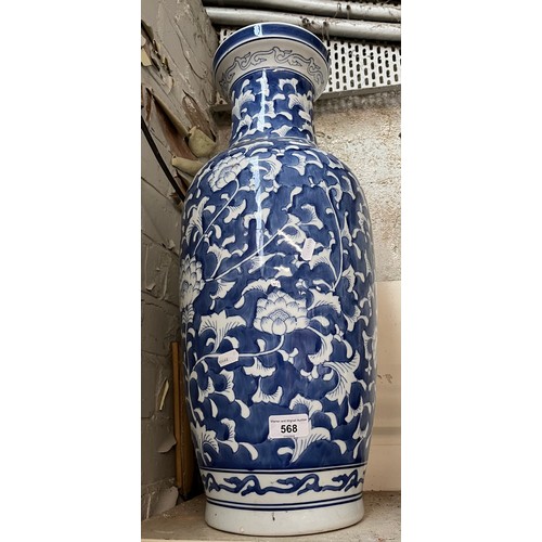 568 - Large blue and white vase with floral pattern