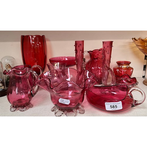 585 - 12 pieces of cranberry glass including a fluted jug by Fenton