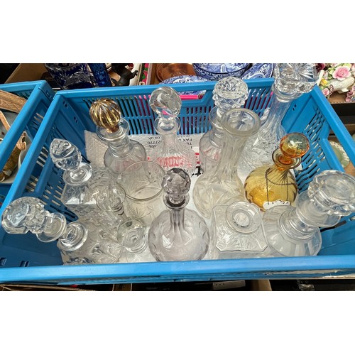 680 - A crate containing 11 decanters (9 with stoppers) and other items of glassware