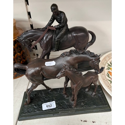 652 - Two bronze effect sculptures of horses