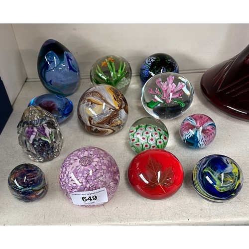 649 - A collection of 13 glass paperweights