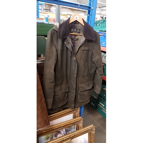 385 - A Classic Ladies Barbour Waxed Jacket with detachable Hood.  (Size 14)