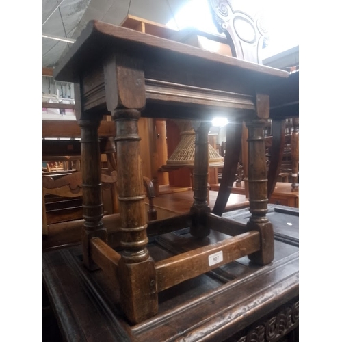 907 - A 17th century style oak joint stool.