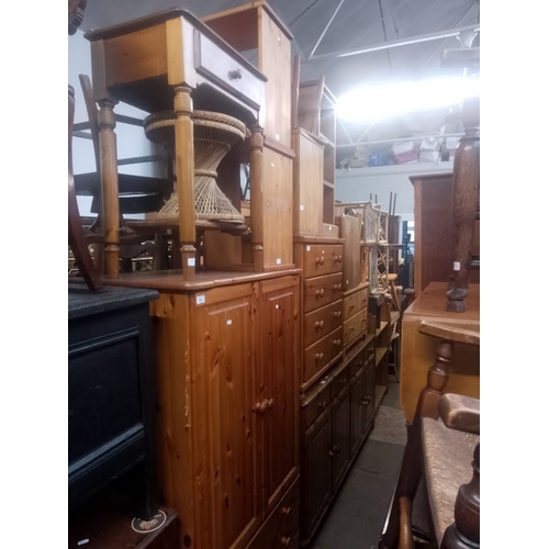 911 - A mixed lot comprising various items of pine furniture, wicker chairs etc.