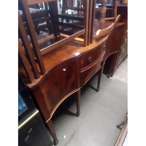 914 - A yew wood sideboard.