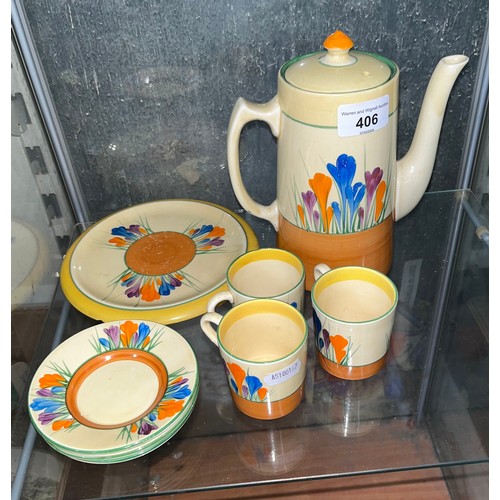 406 - A circa 1930s Clarice Cliff 'Crocus' tea / coffee pot with dish, 4 saucers and 3 cups.