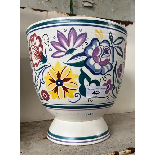 443 - A Poole pot with floral design on white ground