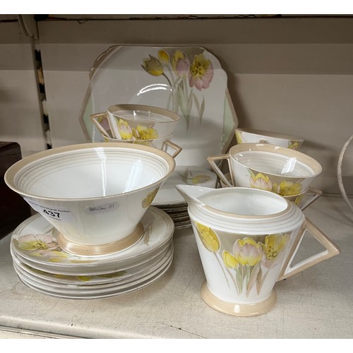 437 - A 1930s Shelley Art Deco tea service, Eve shape decorated with yellow tulips, 19 pieces.