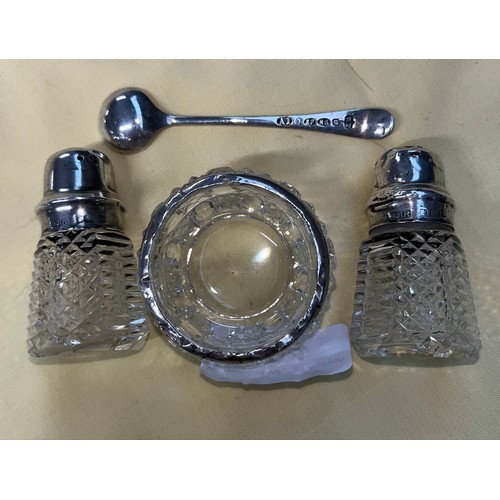 464 - Glass salt and pepper pots with hallmarked silver tops, mustard dish with hallmarked silver rim and ... 