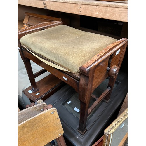 414 - An Arts & Crafts ebonised and rush seat chair together with an Edwardian adjustable piano stool.