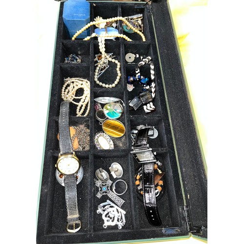 493 - A case of assorted watches and jewellery including silver etc.