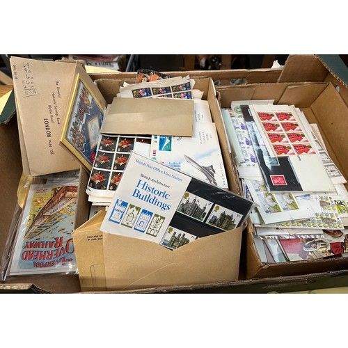 453 - A box of stamps and first day covers etc. Stamps include mint packs