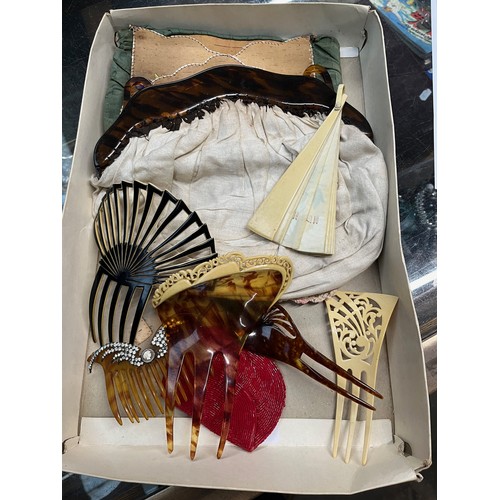 454 - A box containing vintage handbags, hair grips, fan, etc.