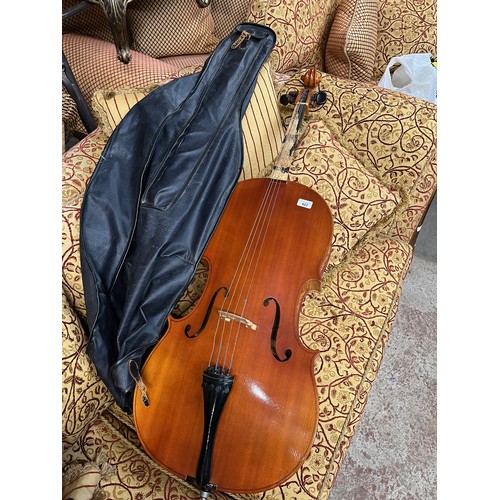 422 - A 20th century East German student cello, 2 piece back length 760mm, with bow and soft case.