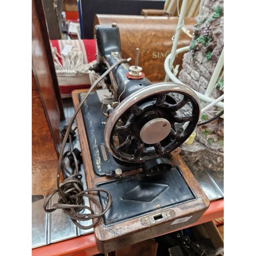 262 - A vintage Singer sewing machine.